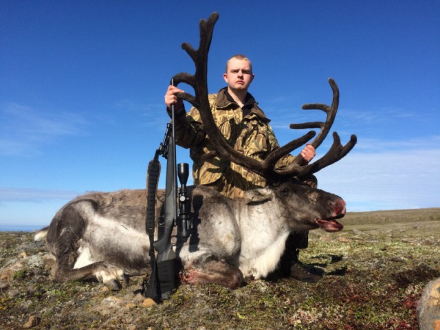 Magni Smárason lang feginn með tarfinn sinn.