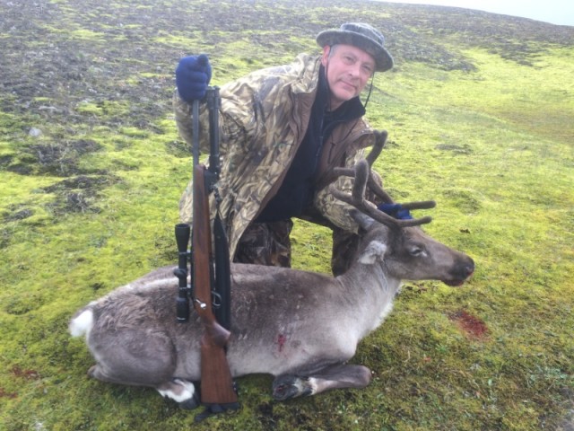 Sigmar með kúna eftir mikil hlaup.