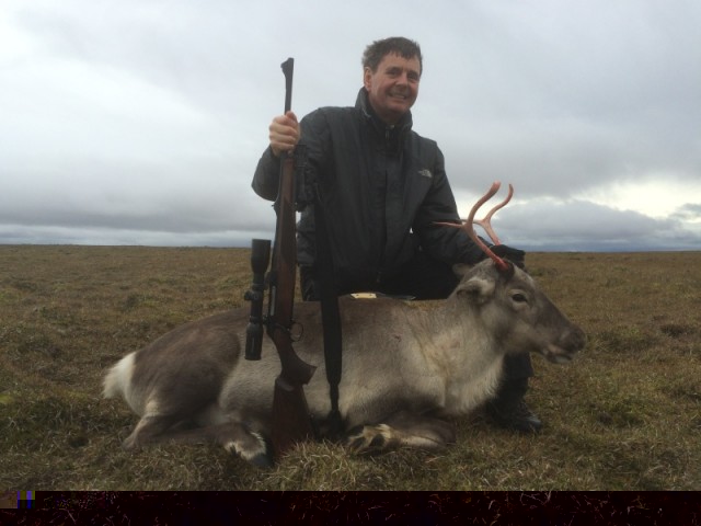 Kristján með kúna.