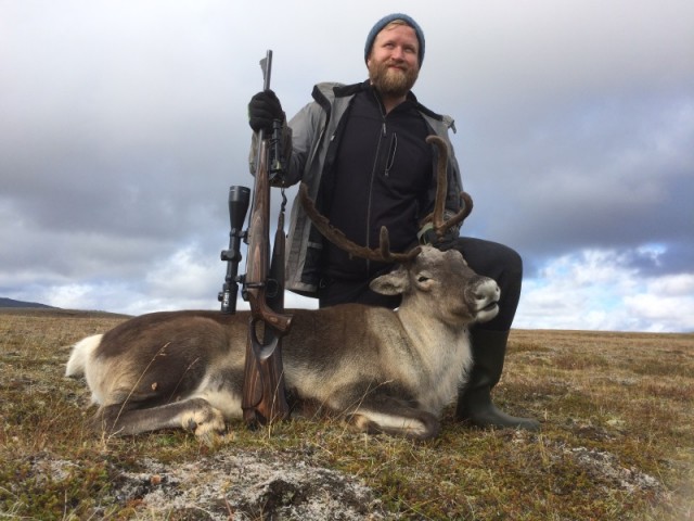 Helgi með kú sína.