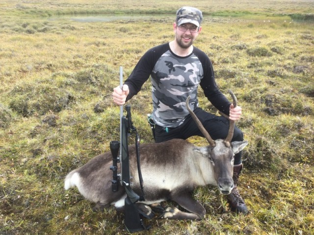 Hallur Þór með sína kú.