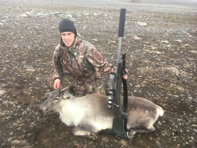 Andri Guðlaugsson með sína kú.