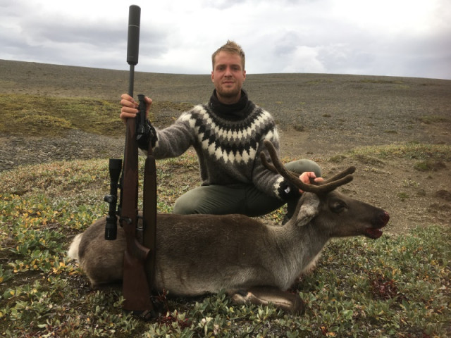 Óli Pétur brattur við sína simlu.
